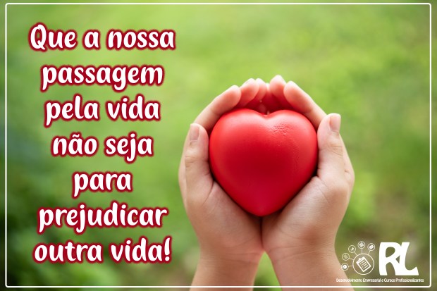 Two hands of child holding a red of rubber heart